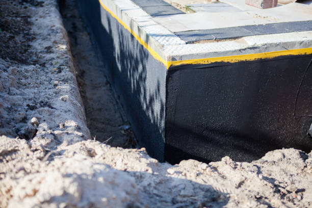 Professional Waterproofing technician working in Paulding, OH
